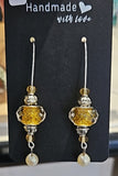 Earrings by Lucy De Sousa