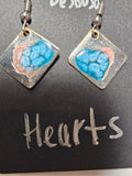 Earrings by Lucy De Sousa