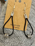 Earrings by Lucy De Sousa