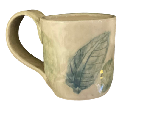 Small mug light green leaves by Yolande
