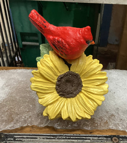 Cardinal Perched On A Daisy Statue