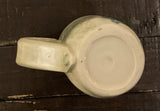 Small mug light green leaves by Yolande