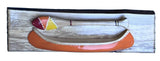 Canoe with paddles by Frank Spadafora