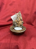 Hand Cast Concrete Guan Yin on a Foo Fish Tea light holder