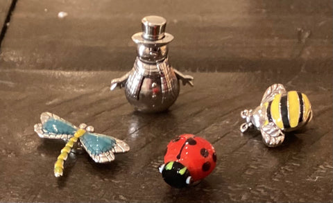 Magnetic bees, ladybug, dragonfly, snowman, Acorn, blue bird, polar bear by Ron