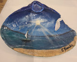 Sailboat on seashell