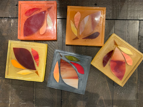 Coaster of glass mosaic hearts and leaves in resin by Mary Jane Jarvis