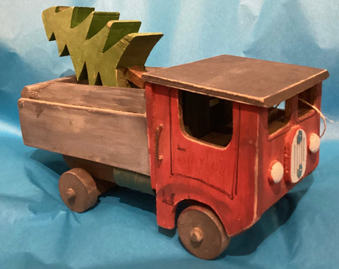 Red Truck with tree by the Wood Shepherd