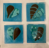Coaster of glass mosaic hearts and leaves in resin by Mary Jane Jarvis