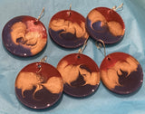 Ornaments of resin by Mary Jane Jarvis