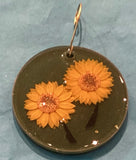 Ornaments of resin by Mary Jane Jarvis