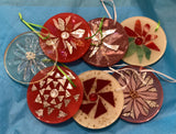 Ornaments of resin by Mary Jane Jarvis