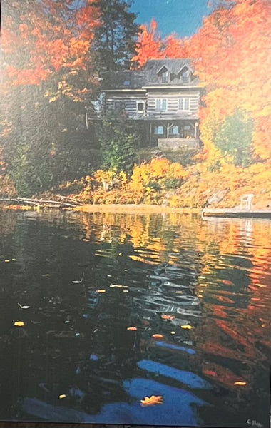 A Lakeside Log House in Autumn by Ed Shea (Laminated Plaque)